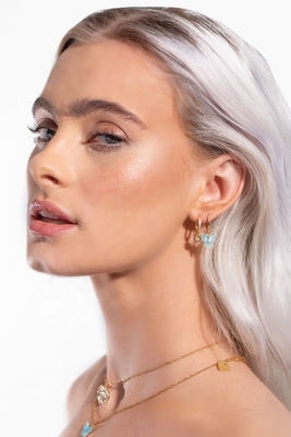 Gold Plated Mini Dangle Heart CZ Huggie Earrings Add a Touch of Glamour to Your Look